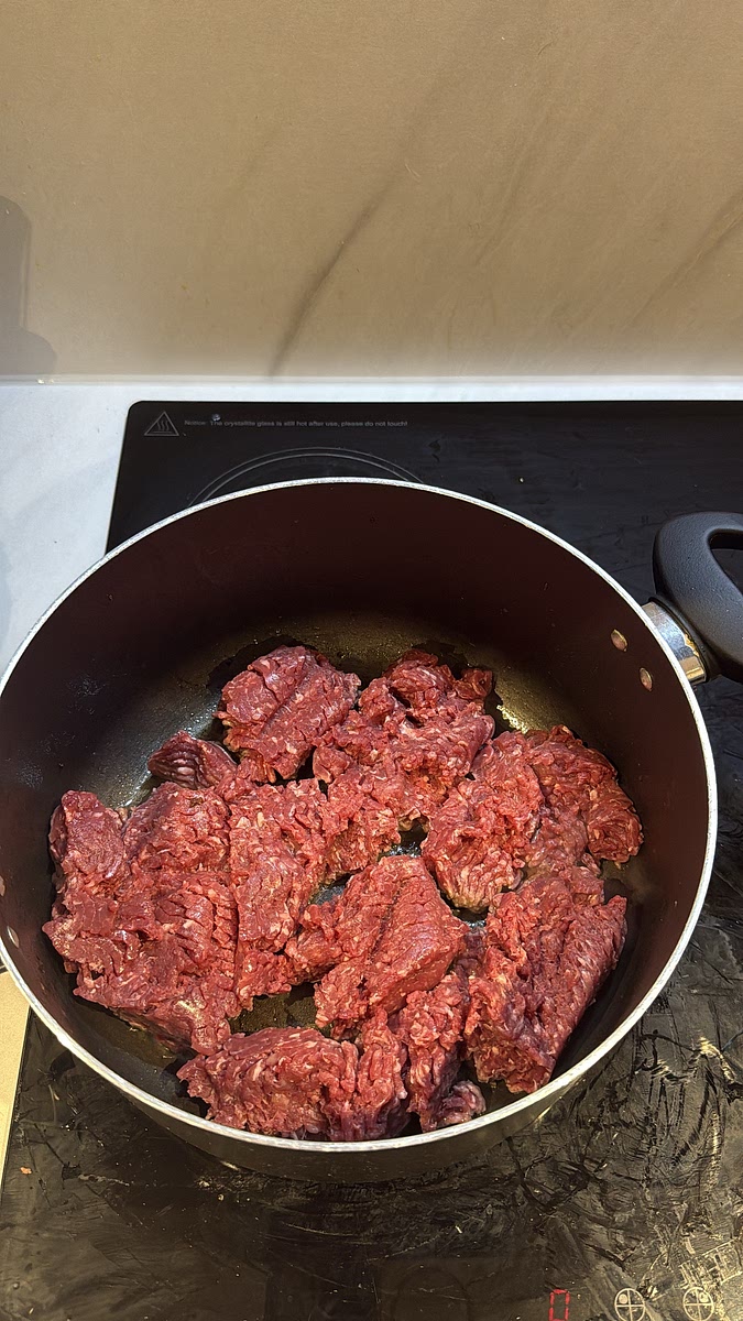 Add the beef mince to a large pot and brown it over medium-high heat, breaking it apart as it cooks. Continue until the mince is fully cooked and nicely browned.