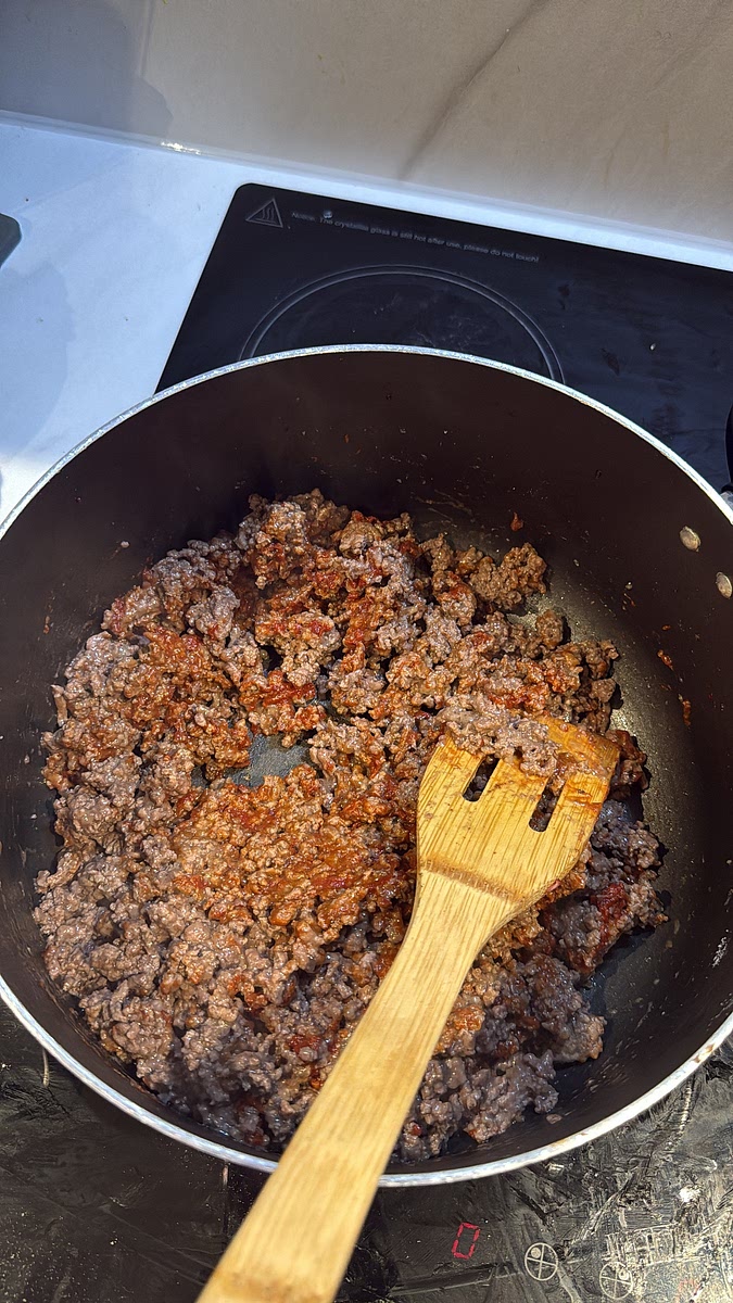 Stir in 2 tbsp tomato purée and allow it to cook into the mince for a couple of minutes