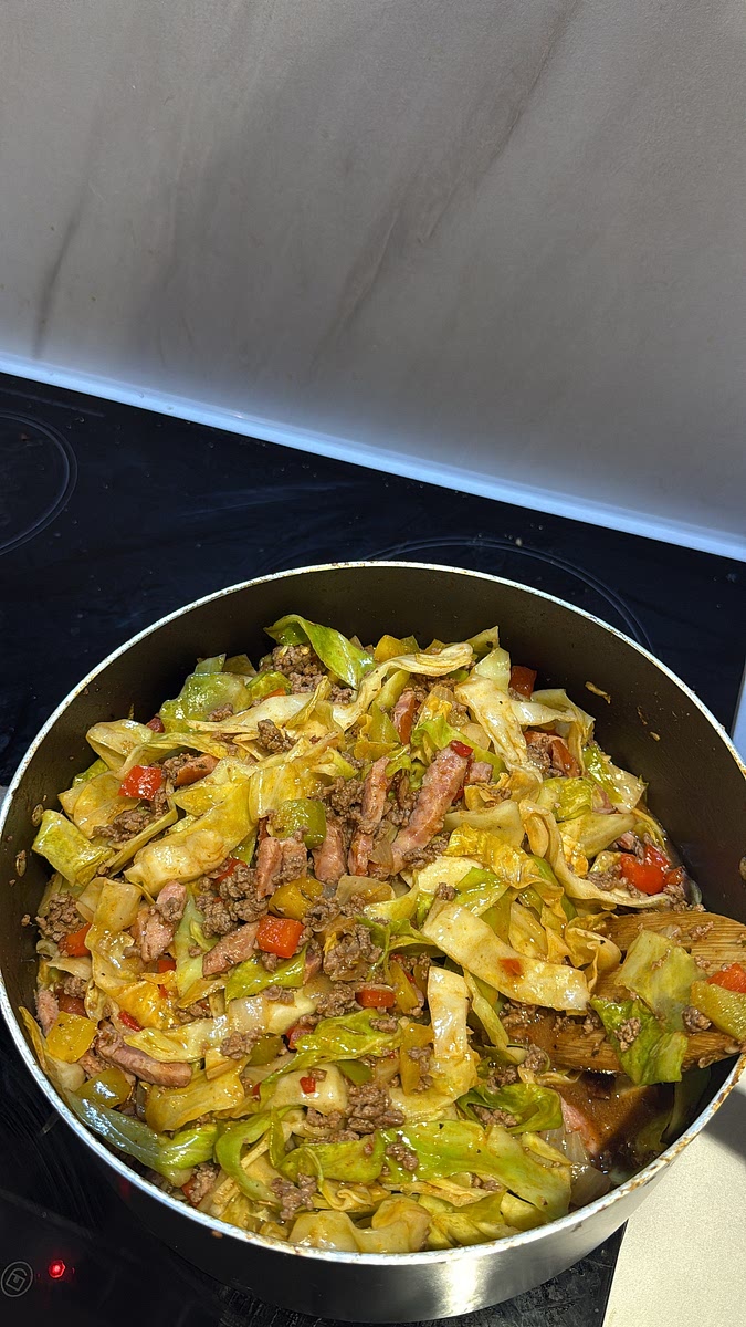 Stir everything together as the cabbage softens and reduces. Continue simmering until the cabbage is tender and has absorbed all that beefy, smoky flavour, while still having a little bite.
