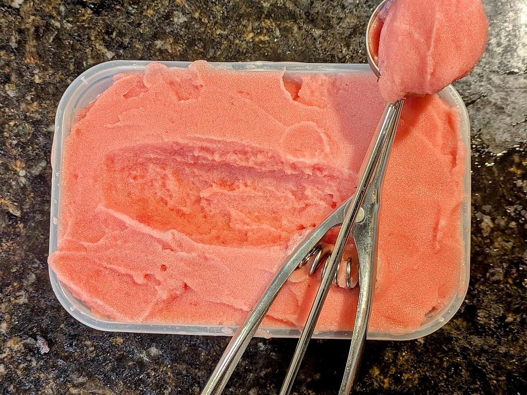 Transfer to an airtight container, and store in the freezer. Let it sit out for about 5 minutes prior to serving.