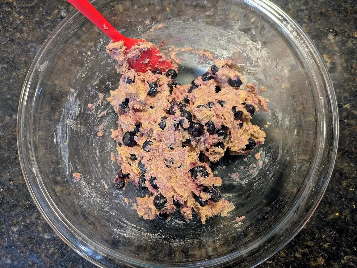 Fold in the frozen blueberries with a silicone spatula.
