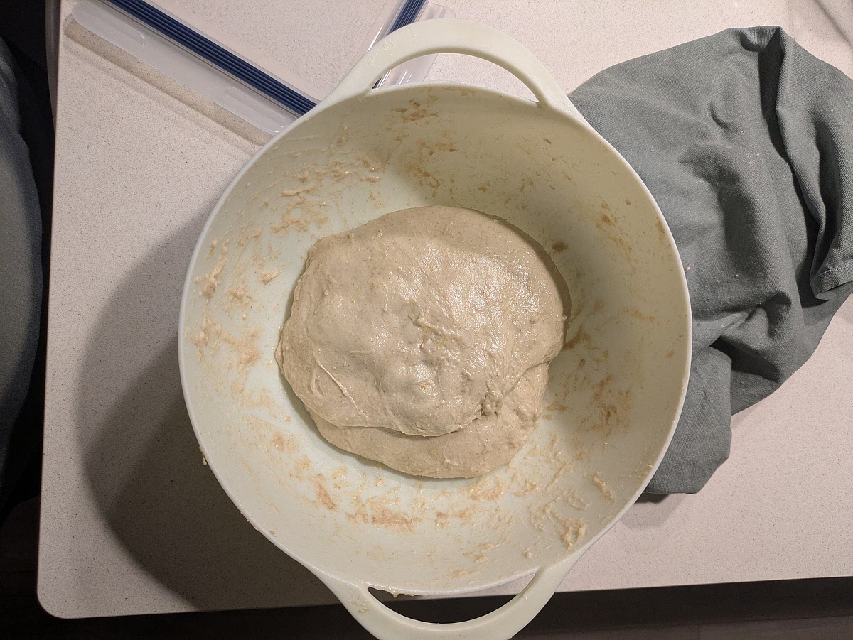 Build Structure & Add Berries (1.5 Hours Total)
Sets 1 & 2 (30 mins apart): Perform standard stretch-and-folds on all four sides of the bowl to build vertical dough strength.
Set 3 (Inclusion Fold): Gently spread the dough out in the bowl. Scatter your chilled, flour-dusted blueberries across the top, then fold the outer edges over the berries to enclose them cleanly without crushing.