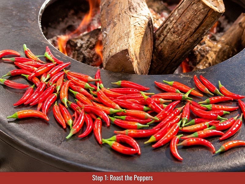 Roast the peppers: Preheat the oven to 450°F (232°C). Roast Thai chili peppers until the skins become lightly charred. The roasting process develops smoky, slightly sweet flavors.