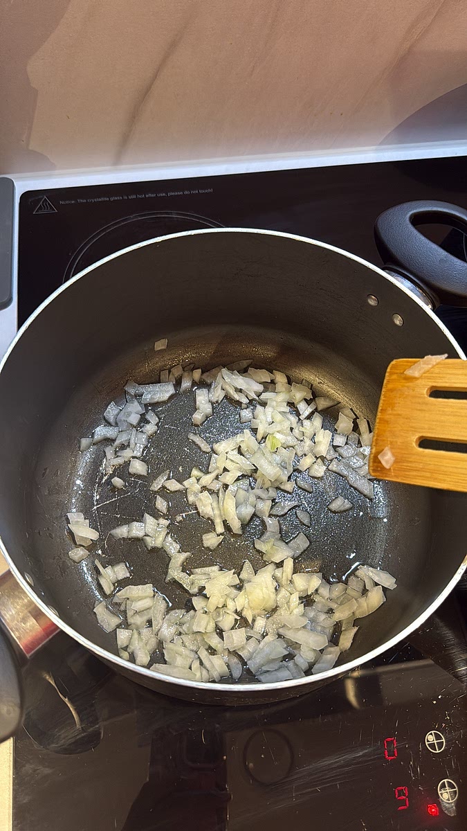 Heat the oil in a saucepan over medium heat. Add the diced onion and cook for 3–4 minutes until softened.