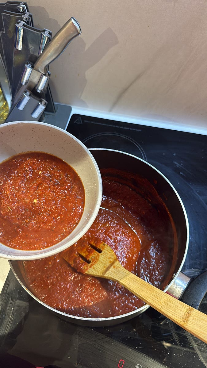 Set aside some of this sauce for topping the chicken before adding any cream.