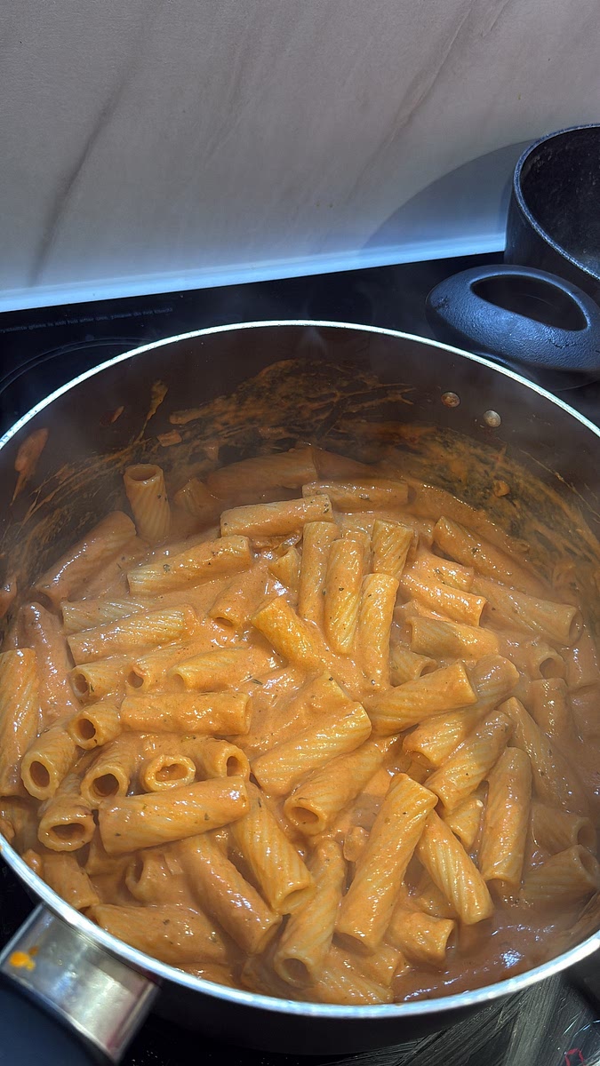 Add the drained tortiglioni and toss thoroughly so the sauce gets right into those ridges and tubes. Add more pasta water a splash at a time until the sauce is silky and clings beautifully to the pasta. Taste and adjust the seasoning.