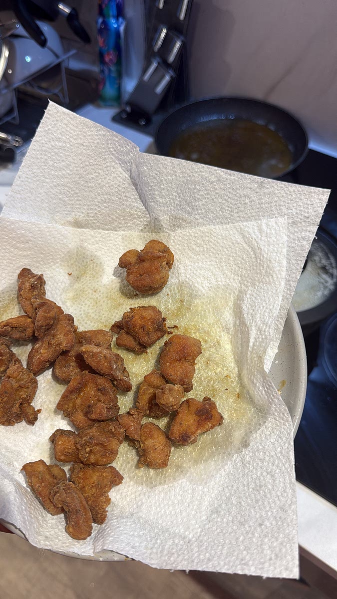 Heat a shallow layer of oil over medium-high heat. Add the chicken without overcrowding the pan and fry until deep golden, crunchy and completely cooked through, around 4–6 minutes depending on size, turning as needed. Transfer onto a wire rack or kitchen paper. don’t sauce it yet. We want to preserve that crunch.