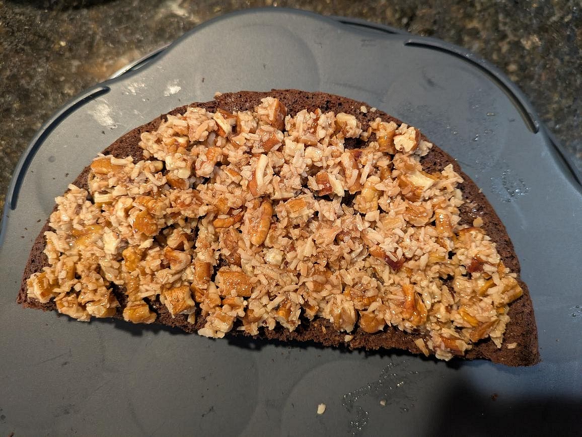 Spread about 2/3 of your filling mixture (~230 g or 1 cup) onto the bottom (now top) of the first layer.
