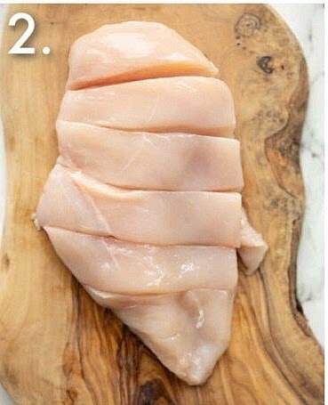 Grease a pan or put down foil and grease to save the clean up.Hasselback the chicken breasts, But do not cut all the way through.