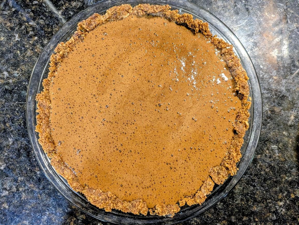 Transfer your batter to a prepared pie crust. The filling should be about the consistency of maple syrup.