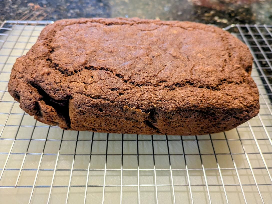 Bake uncovered at 350F for about 45 minutes. The top will be browned and set, a toothpick to the center will come out clean, and the internal temperature will be about 205F. Transfer to a wire rack.