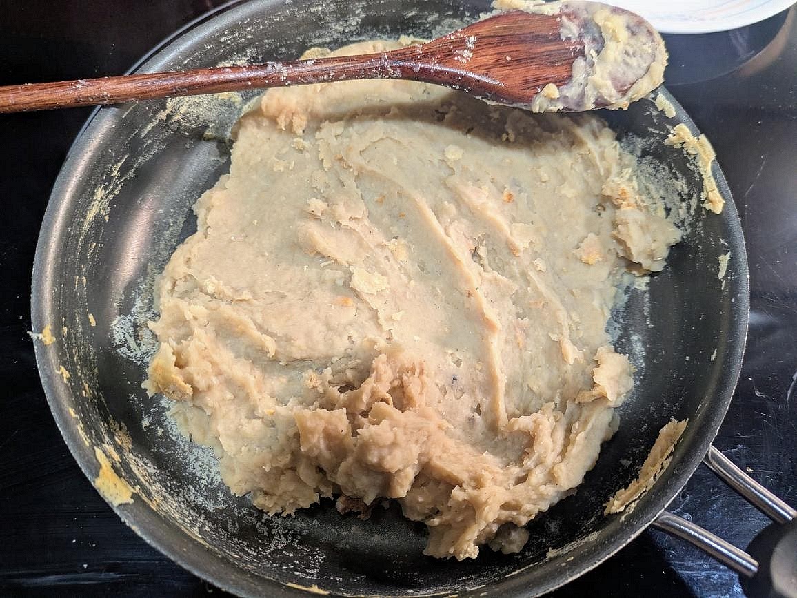 Cook for about 15 minutes with frequent stirring to prevent sticking, or until the filling is has thickened and is drier. Transfer the filling to the fridge to cool totally, about 1 hour.