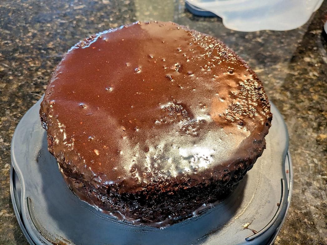 Carefully frost the top and sides of the cake.