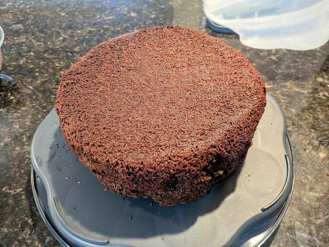 Add the second layer on top, with the "bottom" (flatter side) facing up.