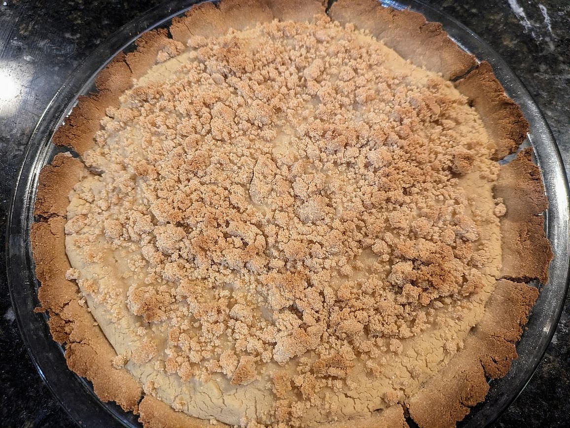 Bake the pie at 350F for about 30 minutes, or until the filling is set, the topping is a light golden brown, and the edges of the crust are golden brown.