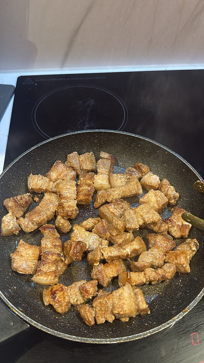 Cook for around 10 minutes, turning regularly, allowing the fat to render and the pork to become golden and crisp around the edges. Carefully drain most of the rendered fat if there is any, leaving approximately 1 tbsp in the pan.