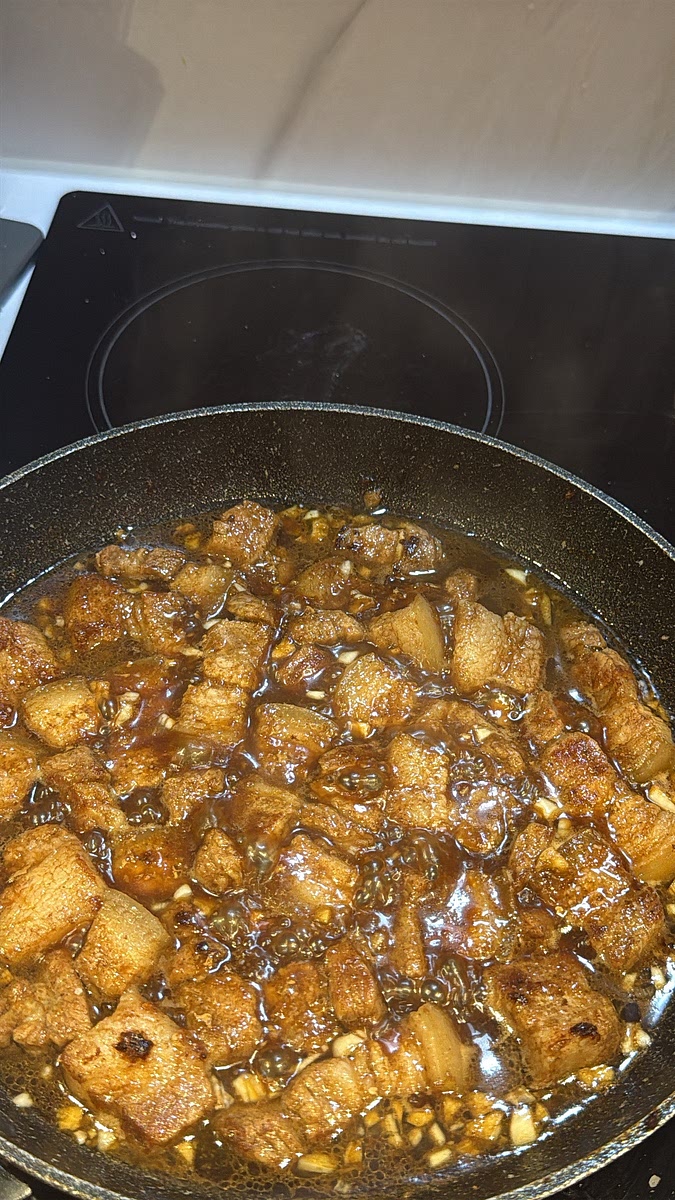 Reduce the heat slightly and add in the sauce stir and bring to a simmer