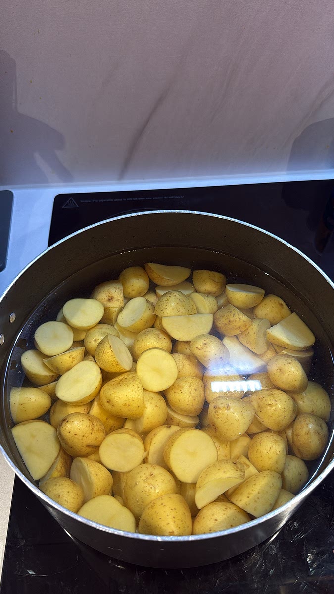 Place them in a saucepan of salted boiling water and parboil for 8–10 minutes.