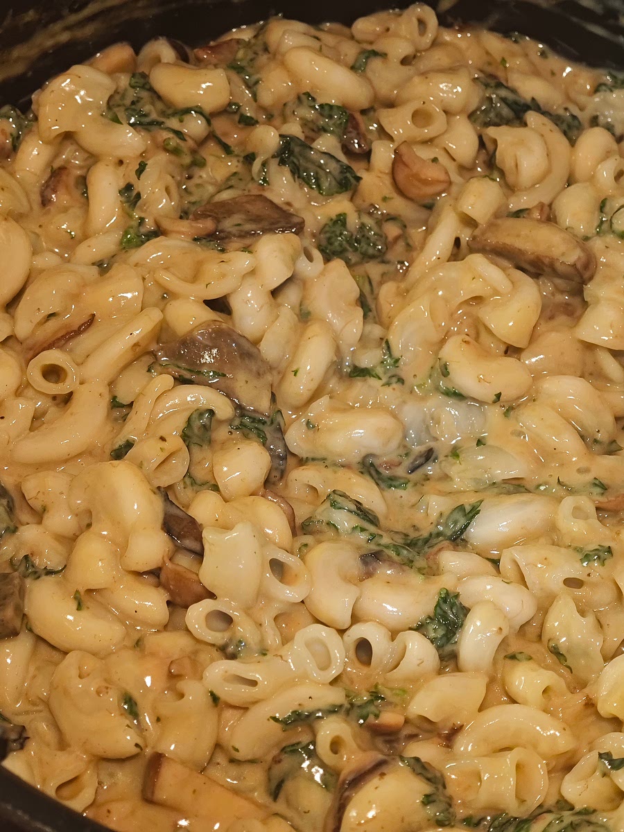 Thicken the sauce with additional roux (I use the gluten free one by Knorr) if necessary. Stir in the chopped blanched nettles and white bean cream. Add the cooked macaroni and coat the pasta gently.