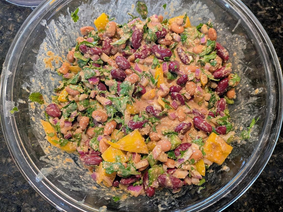 Pour the dressing over the salad, and mix to combine.
