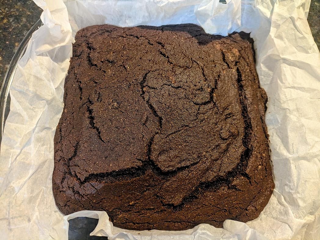 Bake uncovered at 350F for about 30 minutes, or until the top and edges are set and browned, a toothpick to the center comes out clean, and the internal temperature is around 205F.