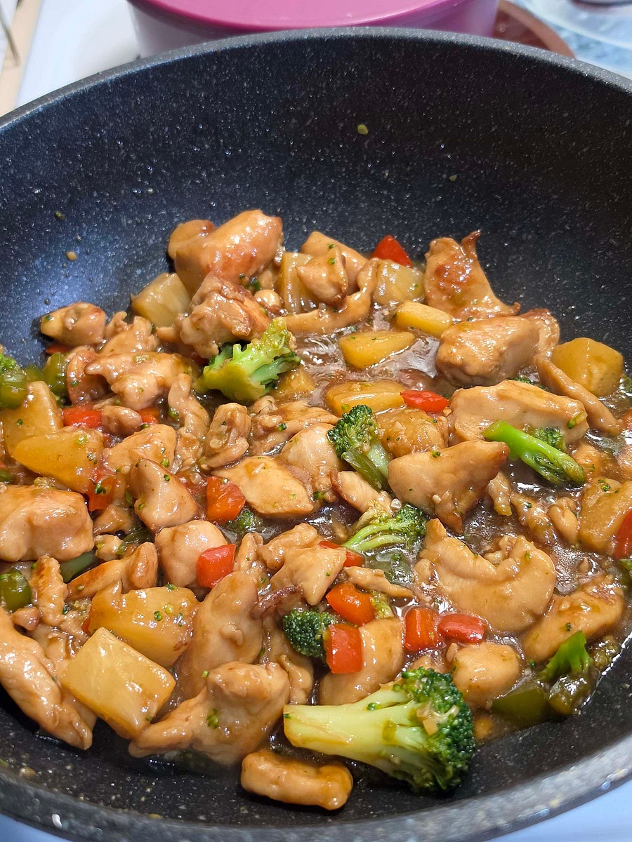 Reduce heat and simmer until the sauce thickens and coats the chicken.