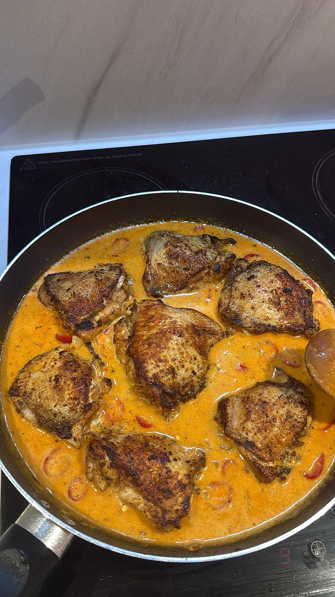 Return the browned chicken thighs to the pan, coating them in the curry sauce. simmer gently for approximately 25–35 minutes, turning occasionally, until the chicken is tender and cooked through.
