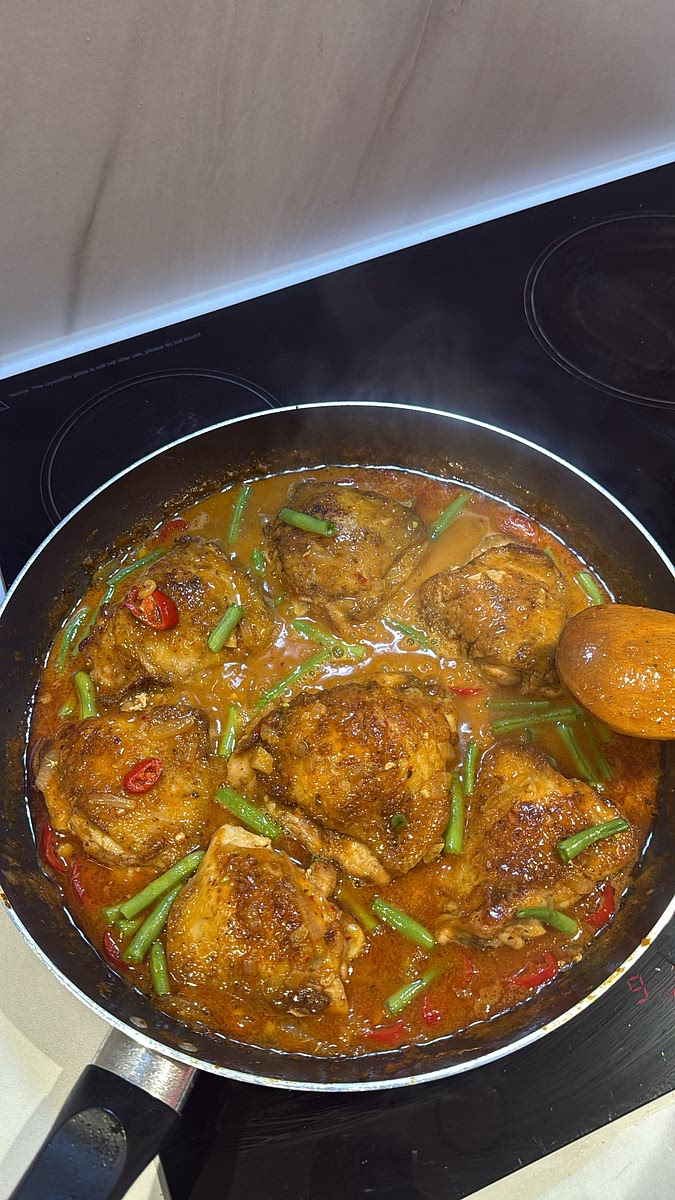 Trim and halve the long green beans, then add them to the curry during the final 5–7 minutes of cooking. Simmer until tender with a slight bite.