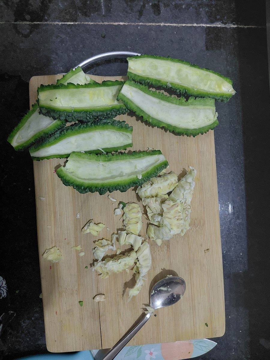 Scoop the seeds out with a spoon.