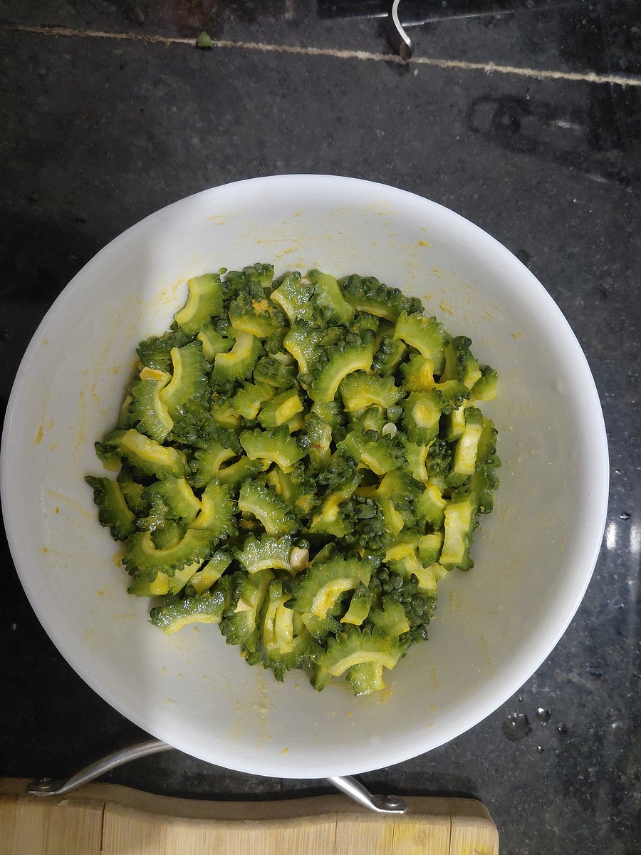 Marinate the Karela with 2 tablespoons of salt, one pinch of turmeric and juice of one lime. Set aside for minimum of 2 hours.