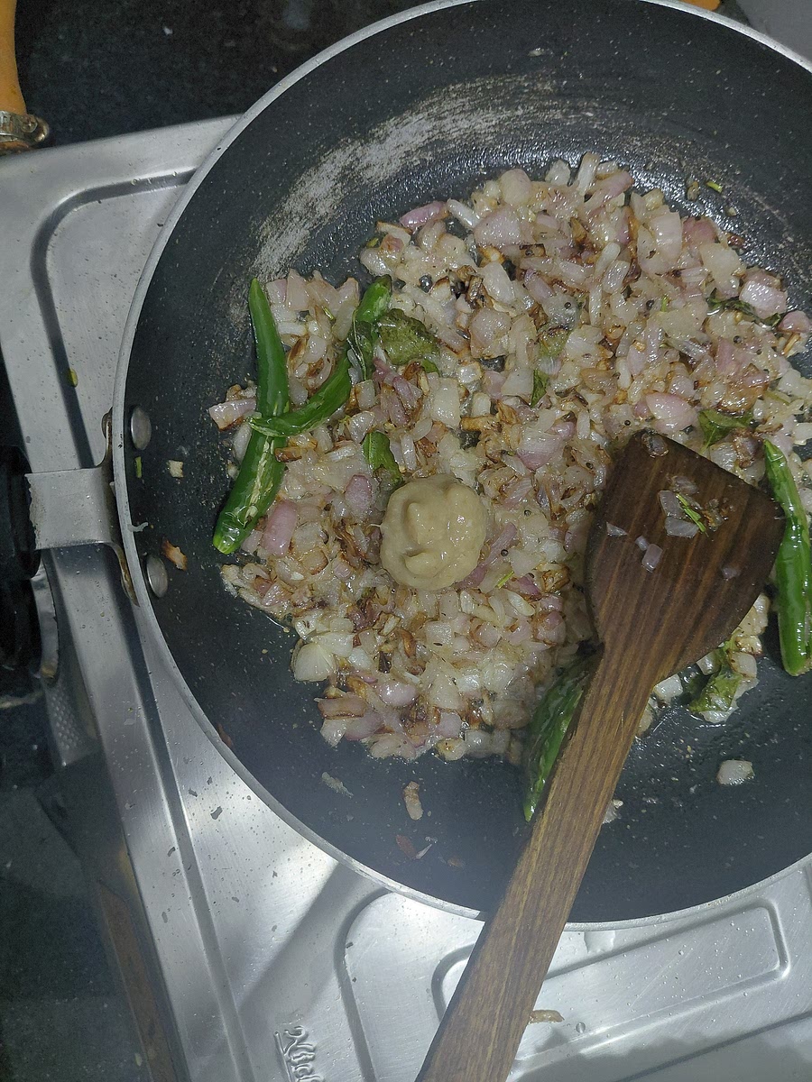 Add 1 tablespoon of Ginger Garlic paste once the onions are brown and saute for 1 min.