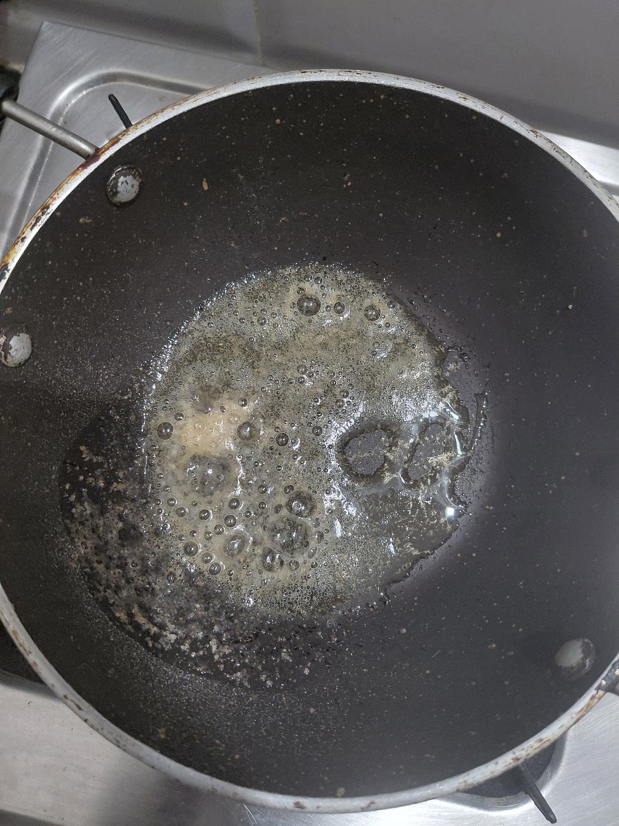 Add 2 tablespoons oil. Once hot add one teaspoon of mustard seeds and hing.