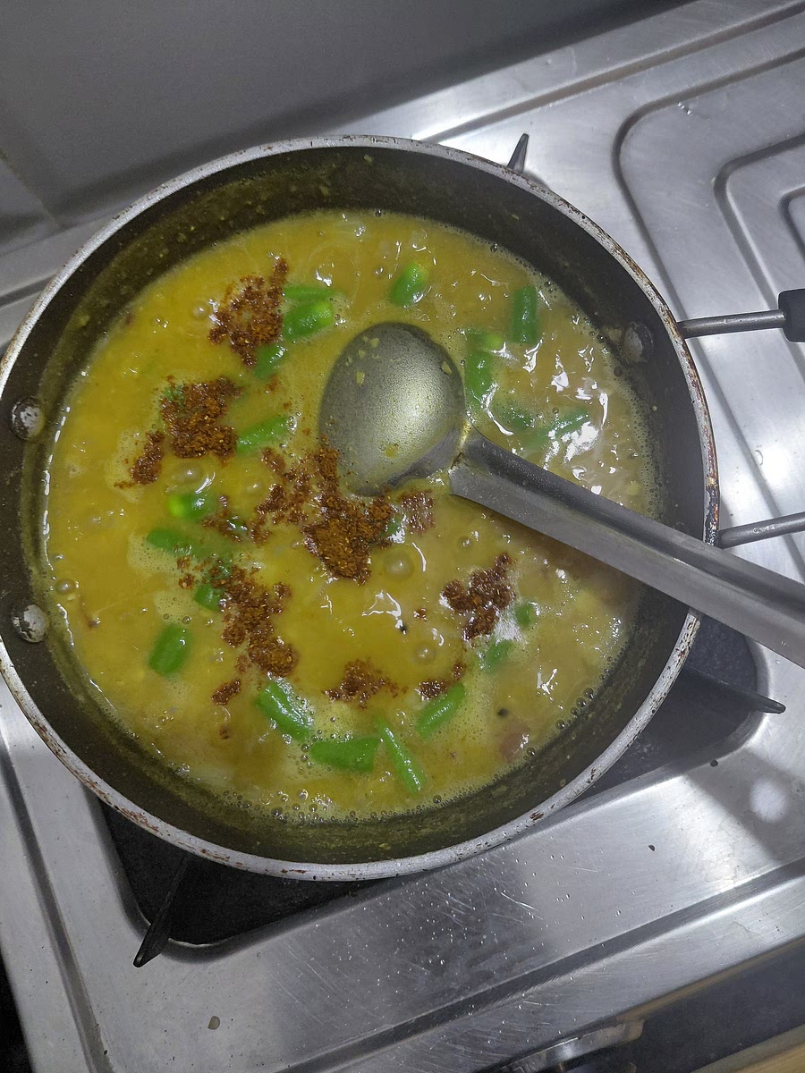 Once the daal comes to a boil add 1/2 teaspoon of garam masala.