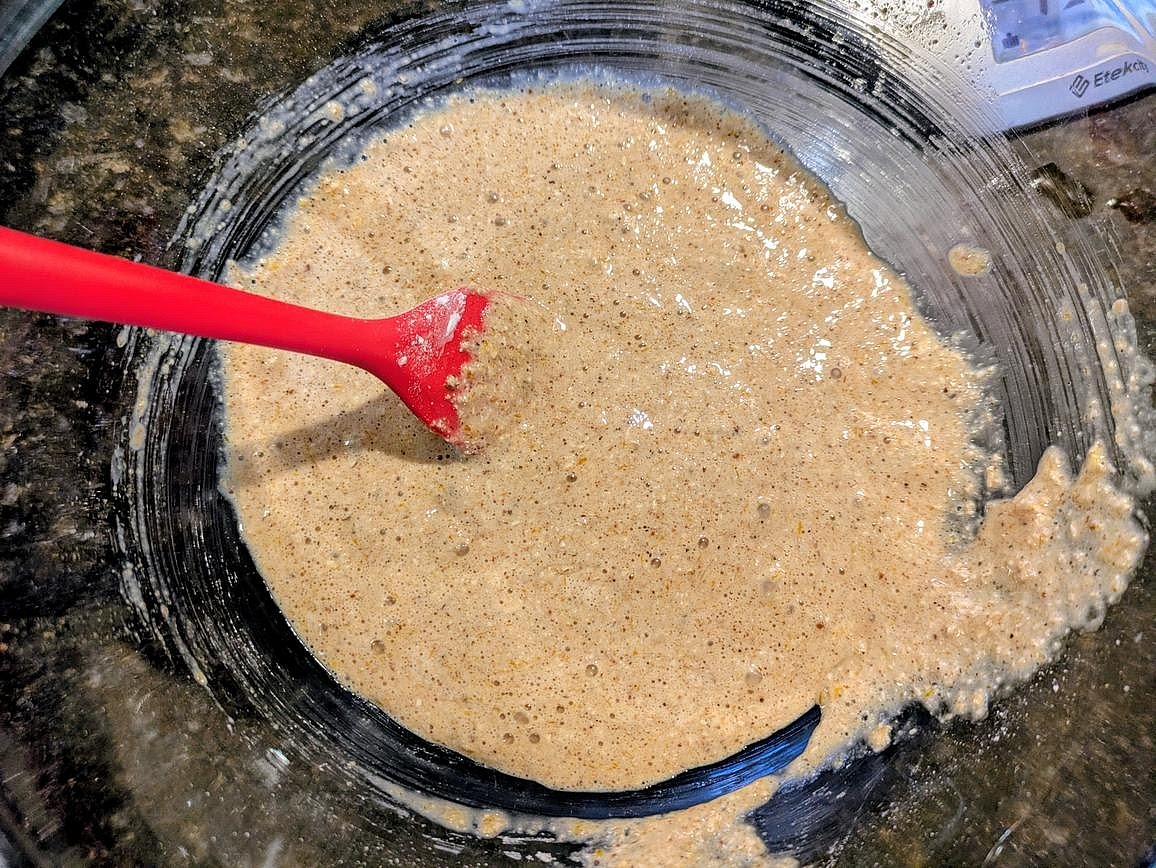 Add the wet ingredients into the dry, and mix until fully combined with a silicone spatula.