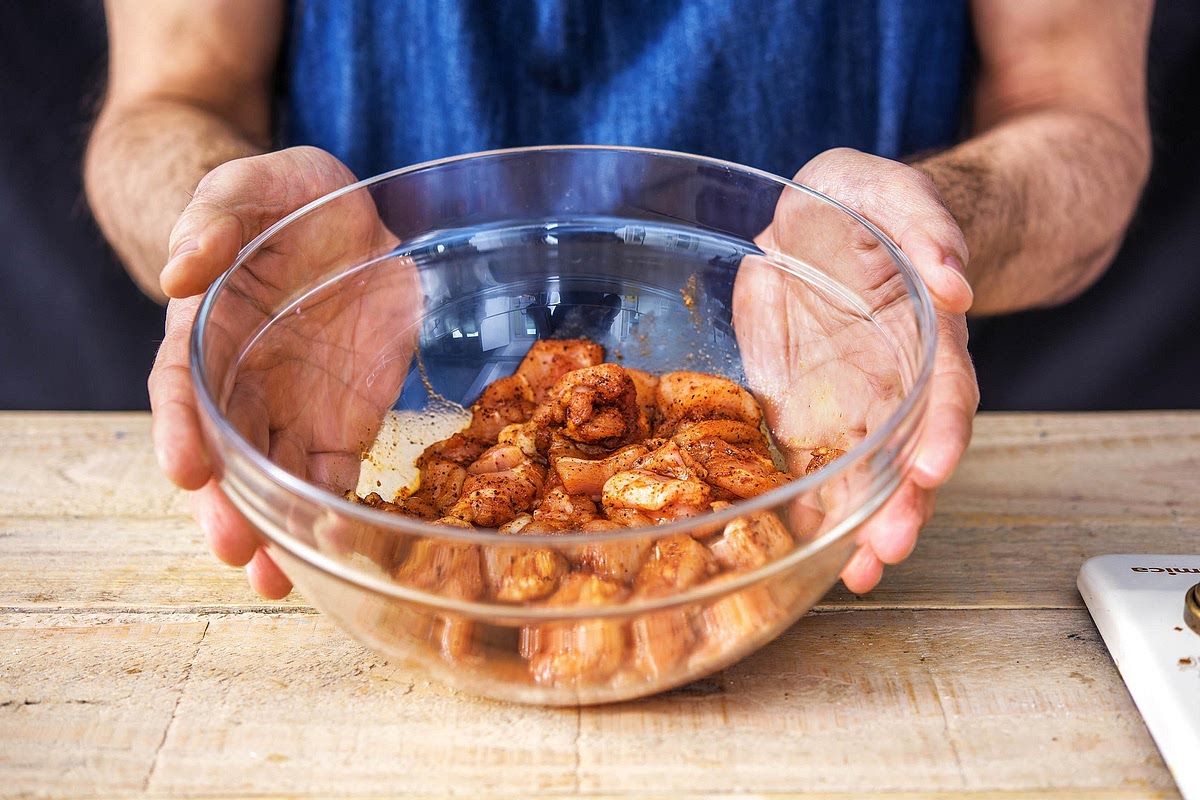 Prepare the Cajun chicken. Combine the paprika, oregano, thyme, garlic powder, onion powder, cayenne, salt and black pepper in a bowl. Add the diced chicken and toss until evenly coated in the seasoning.