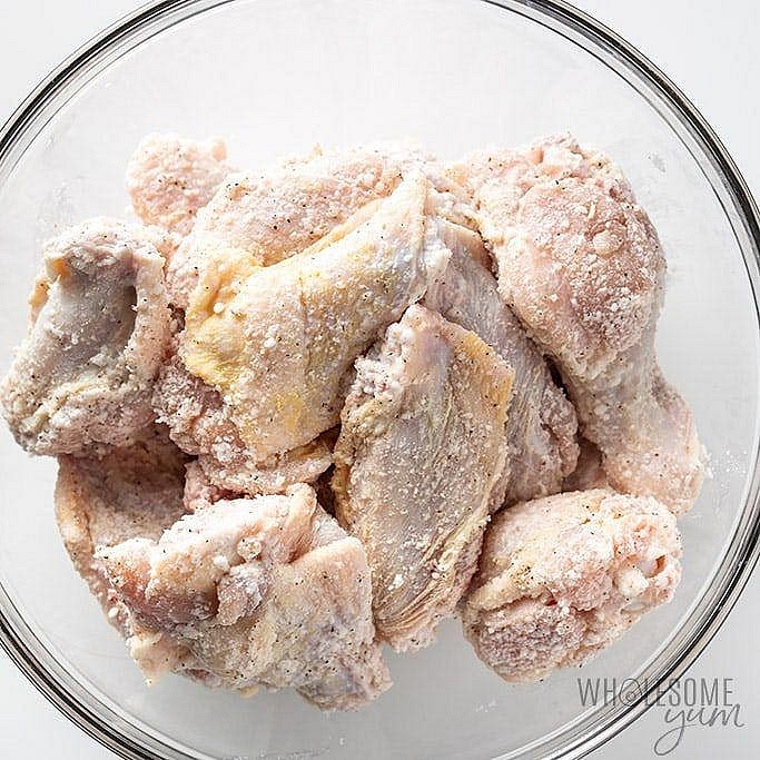 Prepare the crispy chicken wings Preheat your oven to 220°C. Pat the chicken wings completely dry with paper towels. Combine the arrowroot starch, garlic powder, onion powder, salt and pepper. Toss the wings in the seasoning until evenly coated. Arrange in a single layer on a foil-lined baking tray, preferably on an oven-safe wire rack. Bake for approximately 35 minutes, turning halfway through.