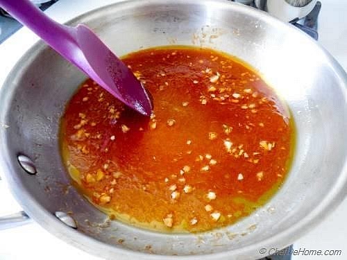 Prepare the honey-sriracha glaze While the wings bake, combine the honey, sriracha, olive oil or dairy-free butter, and lime juice in a small saucepan. Warm gently for 1–2 minutes until smooth and glossy. For a milder sauce, start with one tablespoon of sriracha and adjust to taste. Keep the glaze separate from the raw chicken.