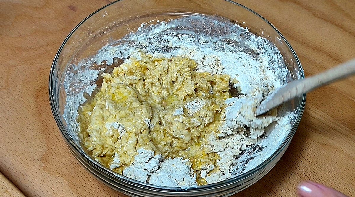 Add the foamy yeast mixture and stir until everything is well combined. Add melted butter, stir it in and let it sit for a few minutes.