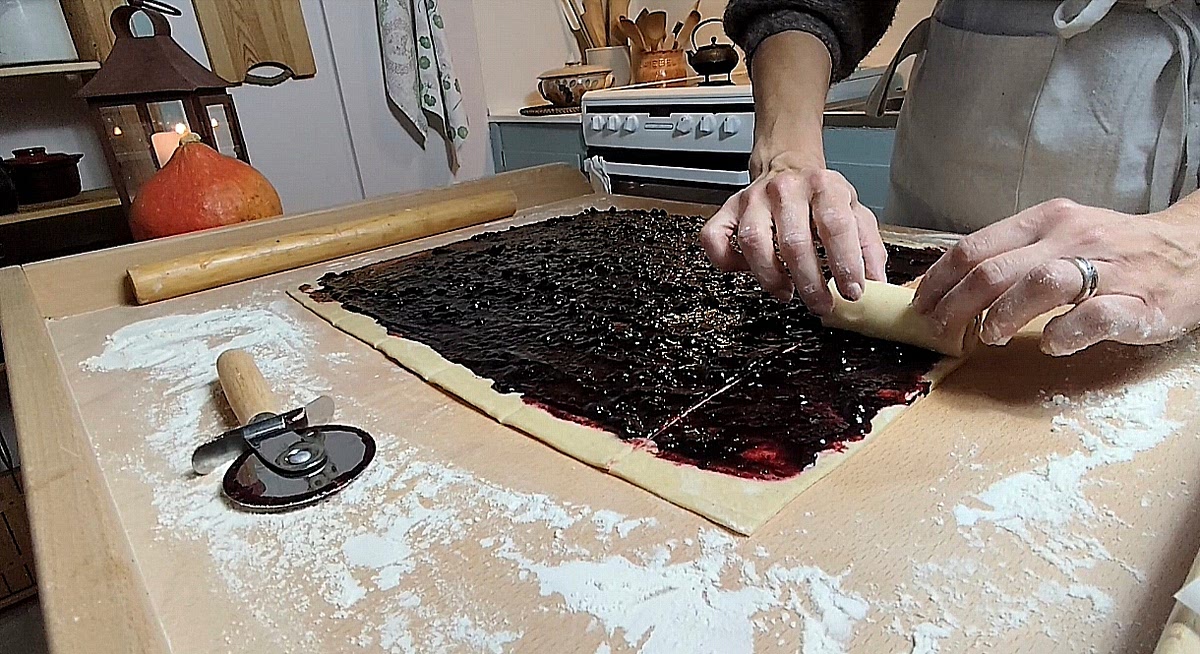 Spread the Filling
Evenly spread the blueberry filling over the rolled-out dough, leaving a small border along one long edge to help seal the rolls when you roll it up.