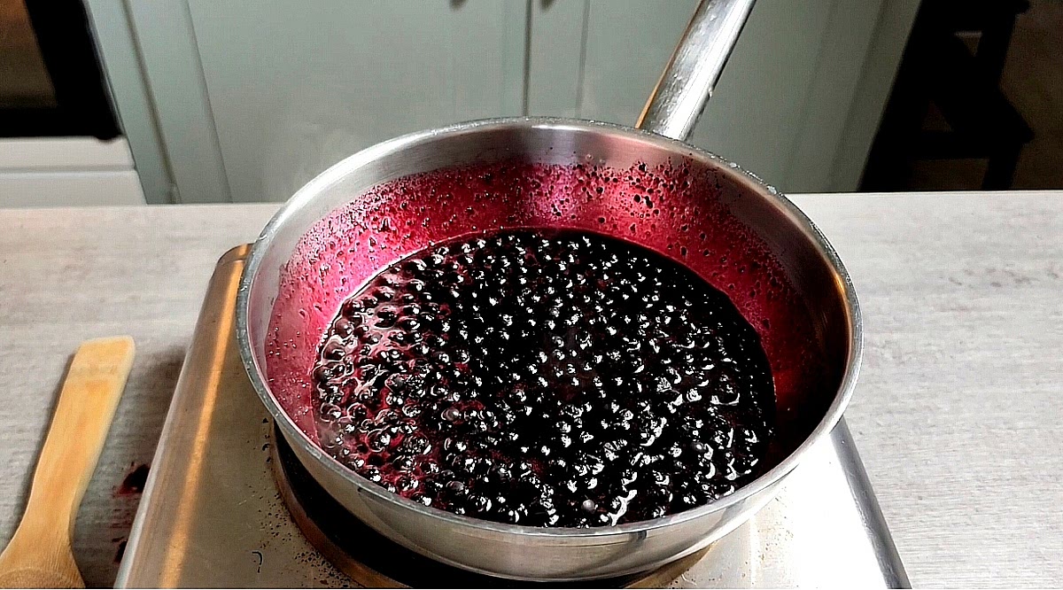 Let the berries release their juices and soften, stirring occasionally.