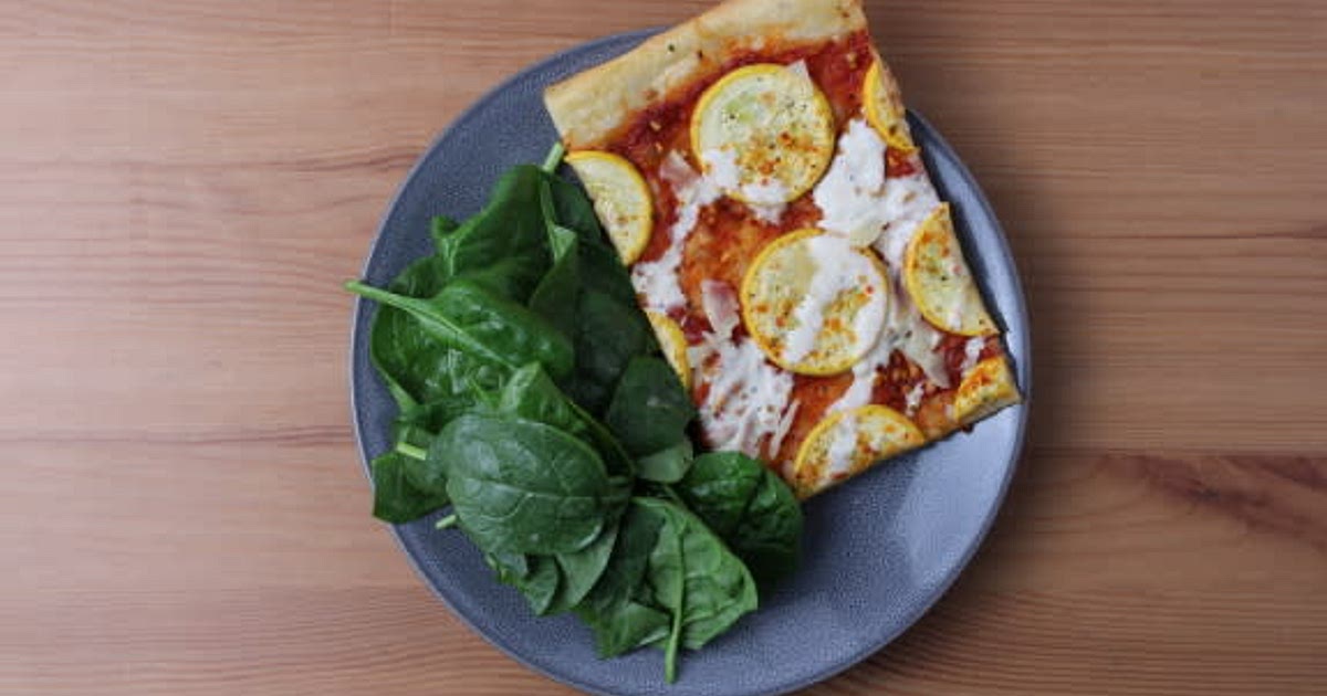 Zucchini & Parmesan Flatbread with Roasted Pepper Sauce & Spiced Labneh Drizzle Recipe | Samsung Food App