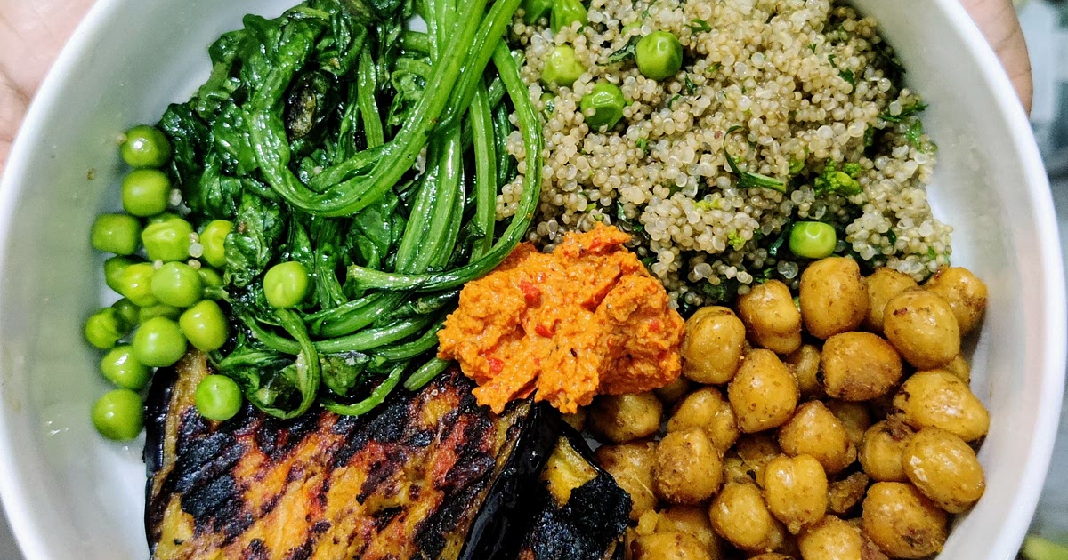 Buddha bowl with basil pea quinoa, romesco aubergine, chickpeas and ...