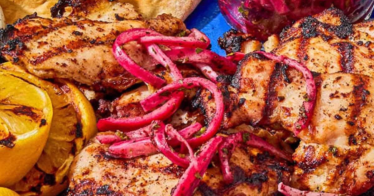 Grilled Chicken Thighs with Sumac, Pickled Onions, and Charred Lemon Recipe | Samsung Food App